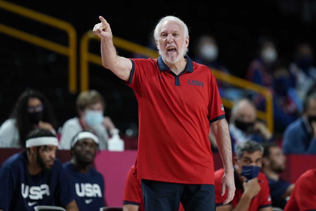 United States head coach Greg Popovich directs his team during a men's basketball preliminary round game against the Czech Republic at the 2020 Summer Olympics, Saturday, July 31, 2021, in Saitama, Japan. (AP Photo/Charlie Neibergall)