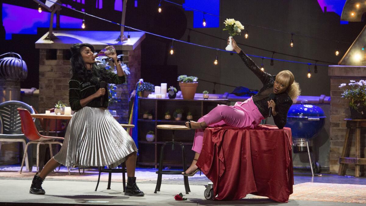 Jessica Williams and Phoebe Robinson in a scene from "2 Dope Queens."