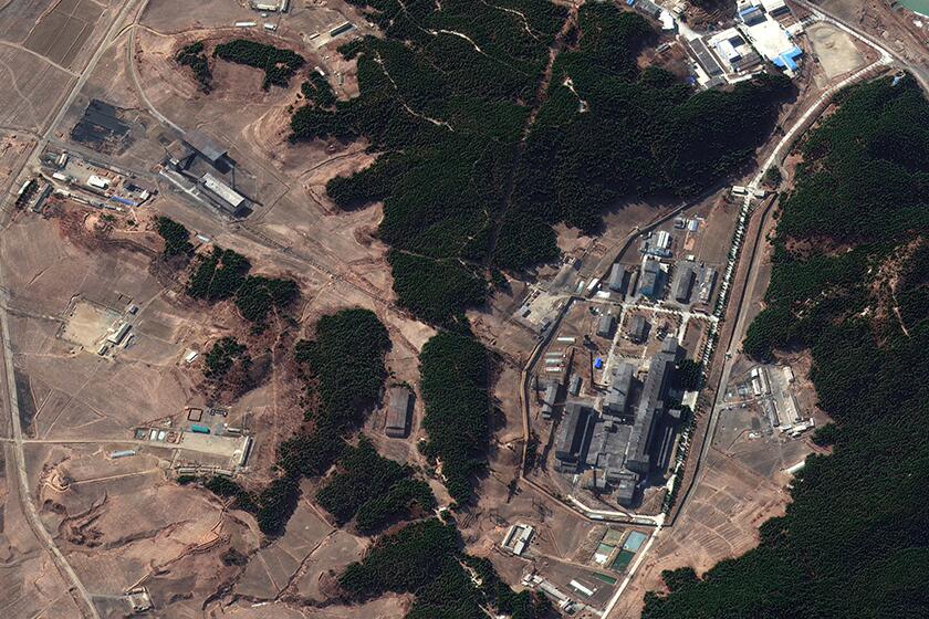An aerial view of North Korea's steam plant, left, and its main atomic complex in Yongbyon.