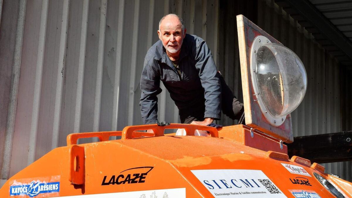 Jean-Jacques Savin works on his barrel ship at the shipyard in Ares, France, on Nov. 15.