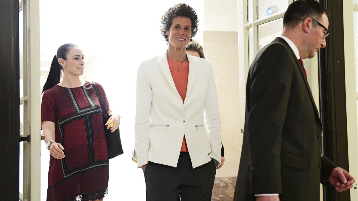 Andrea Constand, center, chief accuser in the Bill Cosby trial, returns from lunch during the sexual assault trial at the Montgomery County Courthouse.