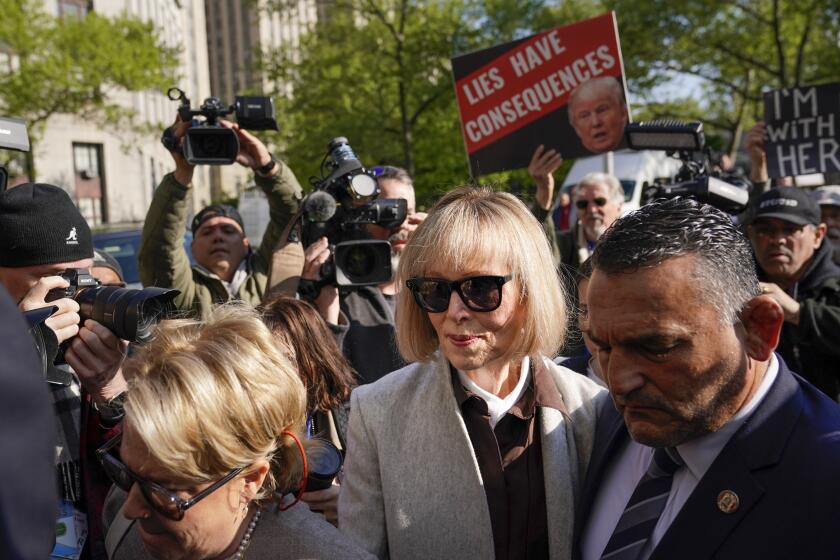 Former advice columnist E. Jean Carroll walks into Manhattan federal court on Tuesday, April 25, 2023, in New York. Jury selection is scheduled to begin in a trial over Carroll's claim that former President Donald Trump raped her nearly three decades ago in a department store dressing room. (AP Photo/Seth Wenig)
