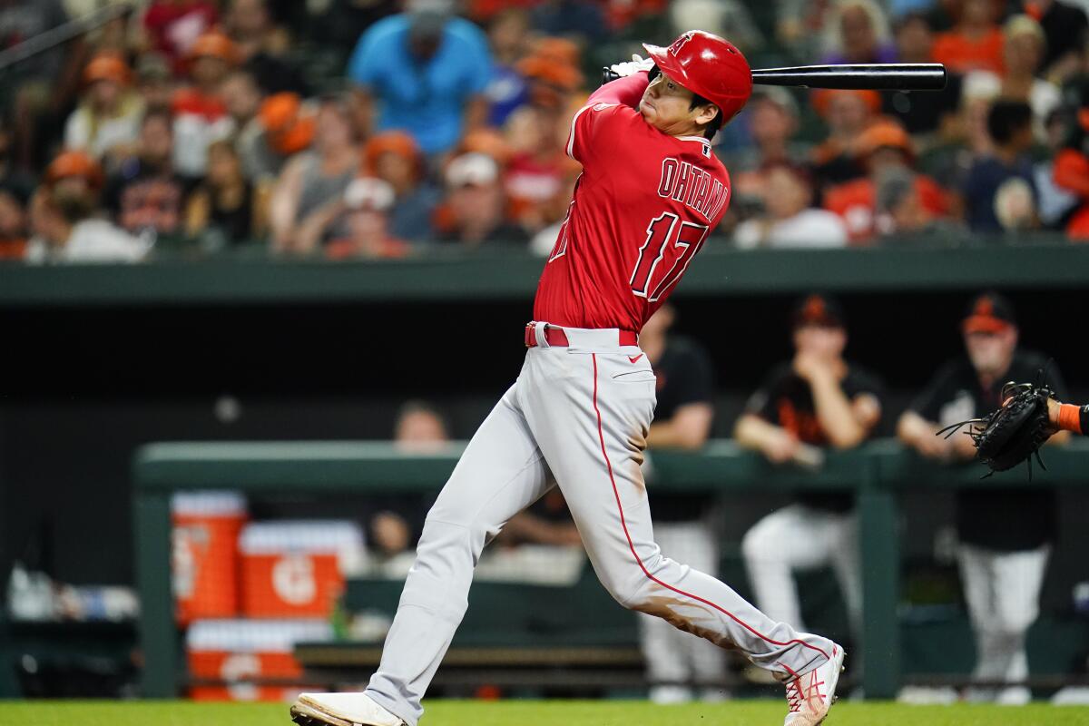 The Angels' Shohei Ohtani singles against the Baltimore Orioles during the seventh inning  July 8, 2022.