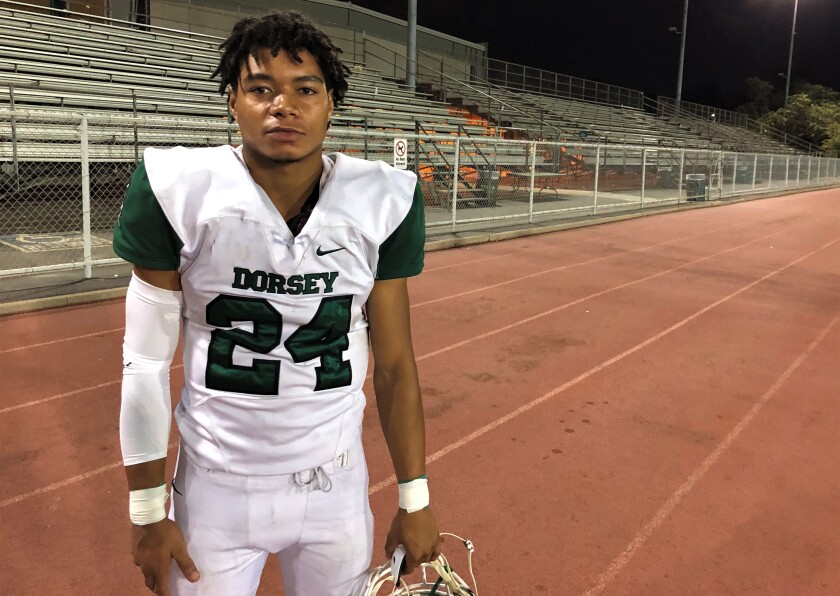 Dorsey running back Harrison Allen after a game.