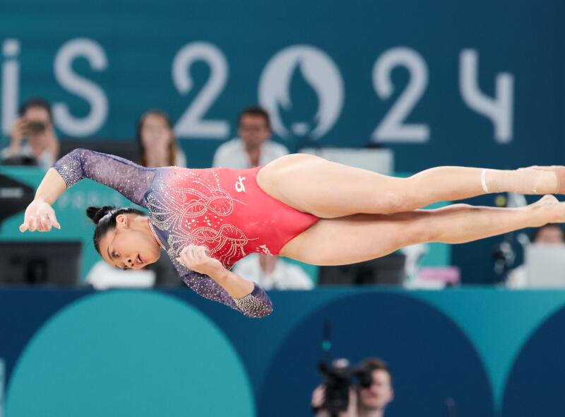 Suni Lee competes in floor exercise in the all-around final at the Paris Games.