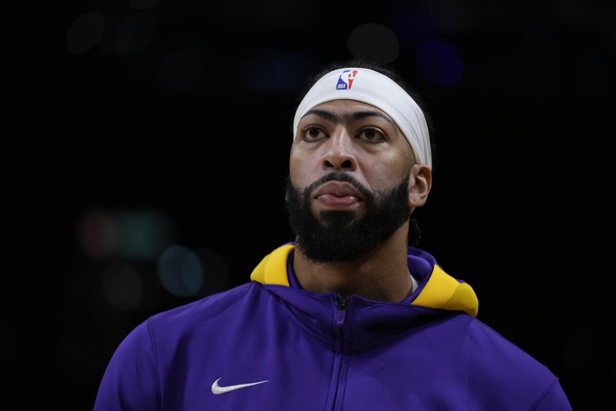 Lakers forward Anthony Davis stands on the court before a game against the Boston Celtics on Dec. 13.