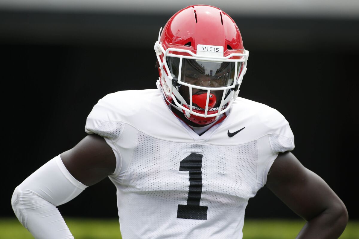 FILE - Georgia outside linebacker Brenton Cox (1) looks on during warm ups before an NCAA college football scrimmage in Athens, Ga., Saturday, April 13, 2019. No. 5 Florida will rely on a number of newcomers, including Brendon Cox, as it tries to dethrone rival Georgia in the Southeastern Conference’s East Division. Some of them are freshmen, others are transfers. (Joshua L. Jones/Athens Banner-Herald via AP, File)