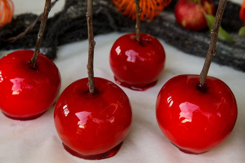 WEST HOLLYWOOD, CA.,OCTOBER 10, 2017--Candied apples: apples coated with cooked sugar, flavoring and a little food coloring. (kirk McKoy /Los Angels Times)