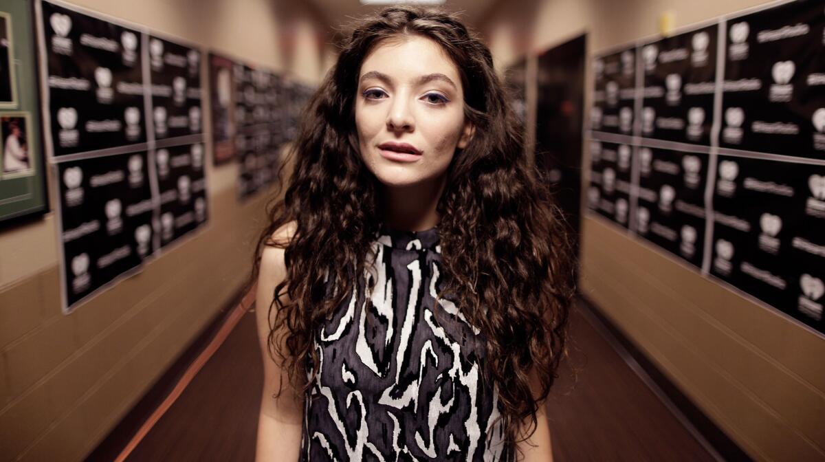 New Zealand singer-songwriter Lorde, shown at the iHeartRadio Music Festival in Las Vegas in September, has released the music video for "Yellow Flicker Beat," her song featured in "The Hunger Games: Mockingjay -- Part 1."