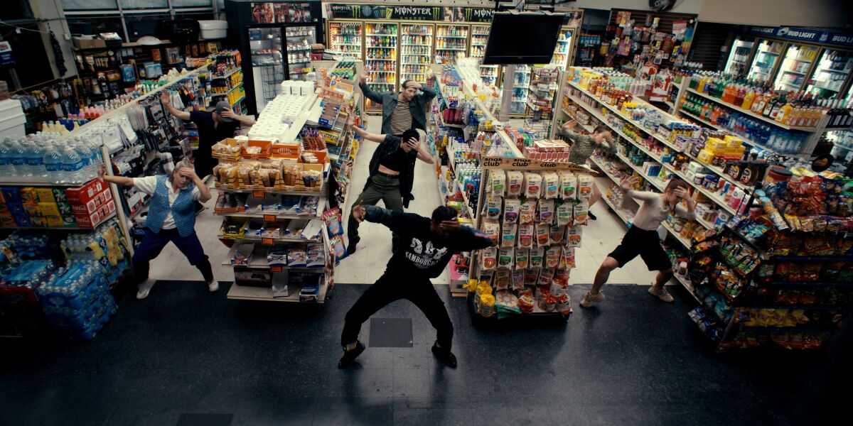 Shoppers dancing at the grocery story in "MisFit."