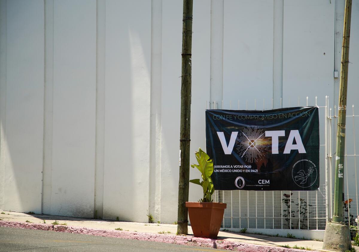 A voting sign at Parroquia San Francisco Javier in Colonia Juarez on Thursday in Tijuana.
