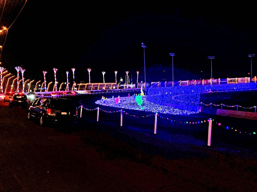Fairgrounds, theme parks open drive-through holiday shows to
offset lost revenue 3 Light show at Irwindale Speedway