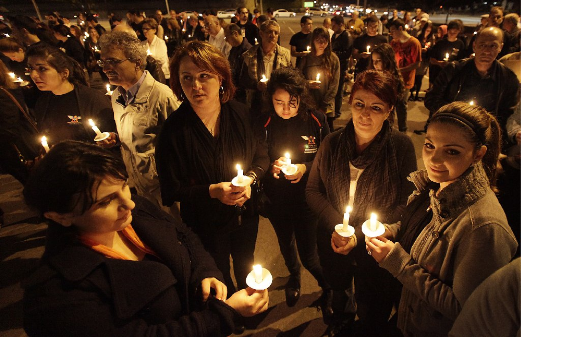 Armenian Americans and supporters hold a 2013 candlelight vigil at the Glendale Civic Auditorium in memory of those who died in the Armenian genocide.