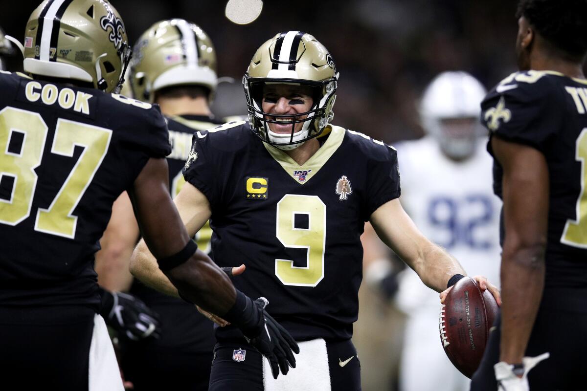 New Orleans Saints quarterback Drew Brees celebrates his 540th career touchdown pass.