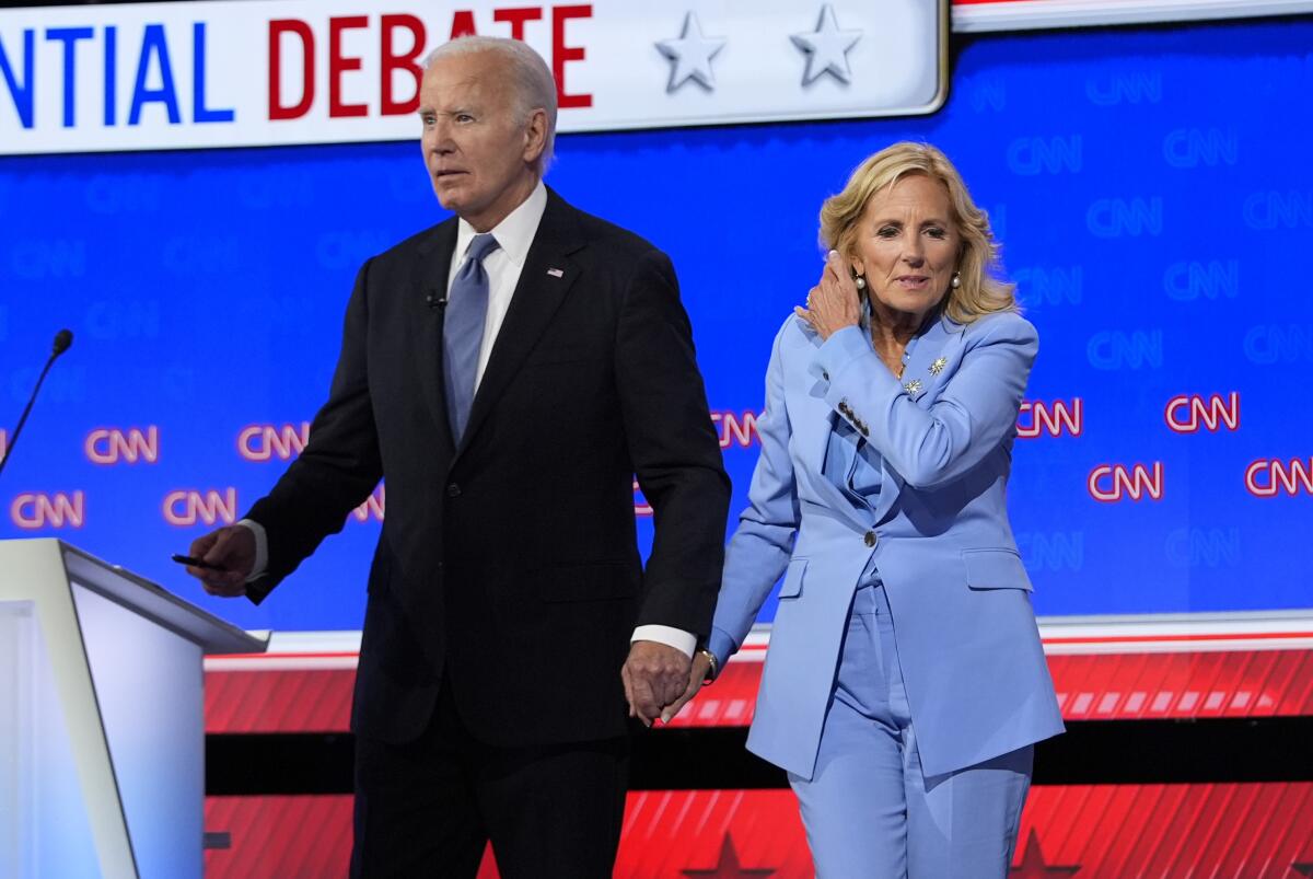 First Lady Jill Biden joins President Biden onstage after Thursday's presidential debate.