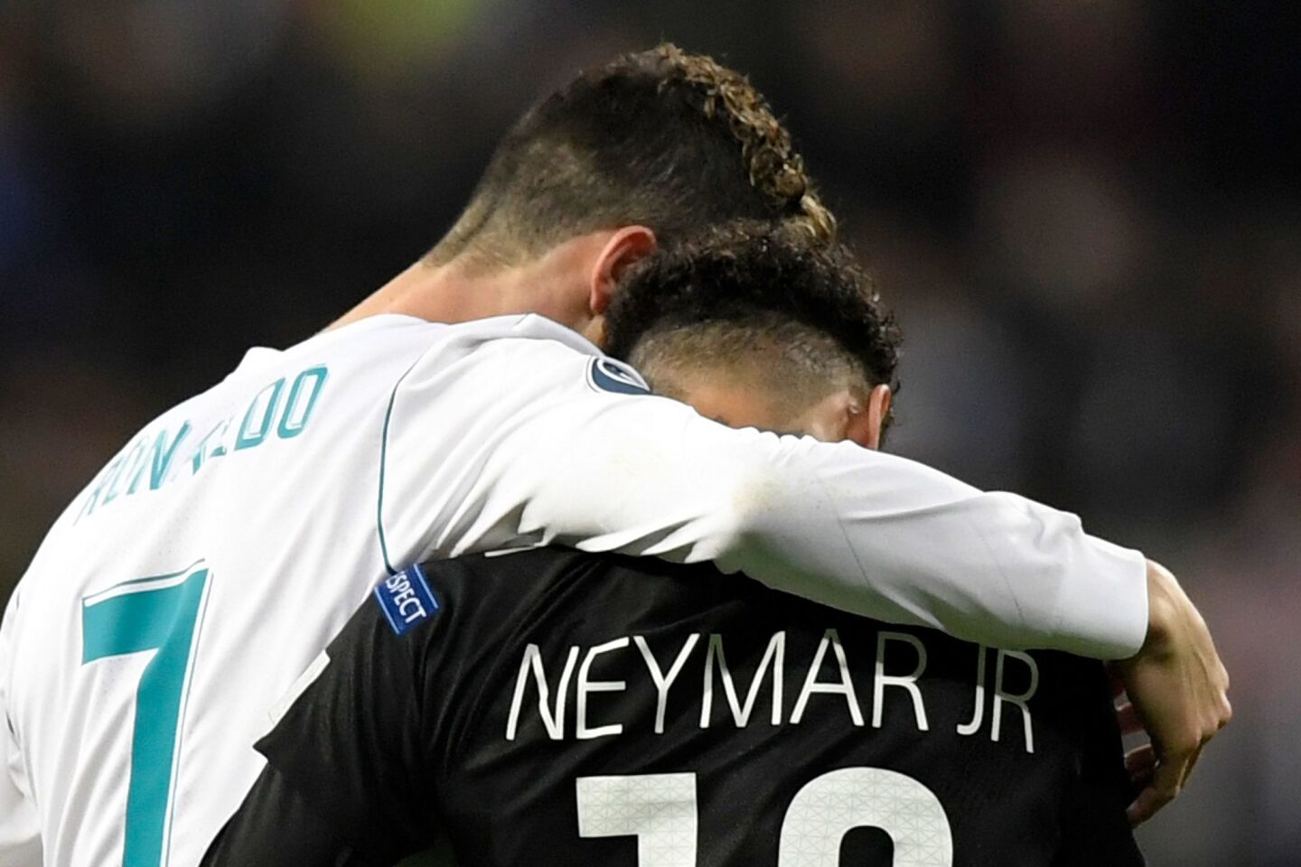 Real Madrid's Portuguese forward Cristiano Ronaldo (L) and Paris Saint-Germain's Brazilian forward Neymar leave the pitch during the UEFA Champions League round of sixteen first leg football match Real Madrid CF against Paris Saint-Germain (PSG) at the Santiago Bernabeu stadium in Madrid on February 14, 2018. / AFP PHOTO / GABRIEL BOUYSGABRIEL BOUYS/AFP/Getty Images ** OUTS - ELSENT, FPG, CM - OUTS * NM, PH, VA if sourced by CT, LA or MoD **