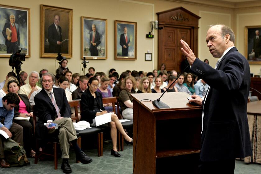FILE - In this June 23, 2008 file photo, James Hansen, a leading researcher on global warming, gives a briefing on global warming on Capitol Hill in Washington. NASA’s top climate scientist in 1988, Hansen warned the world on a record hot June day that global warming was here and worsening. In a scientific study that came out a couple months later, he even forecast how warm it would get, depending on emissions of heat-trapping gases. (AP Photo/Susan Walsh, File)
