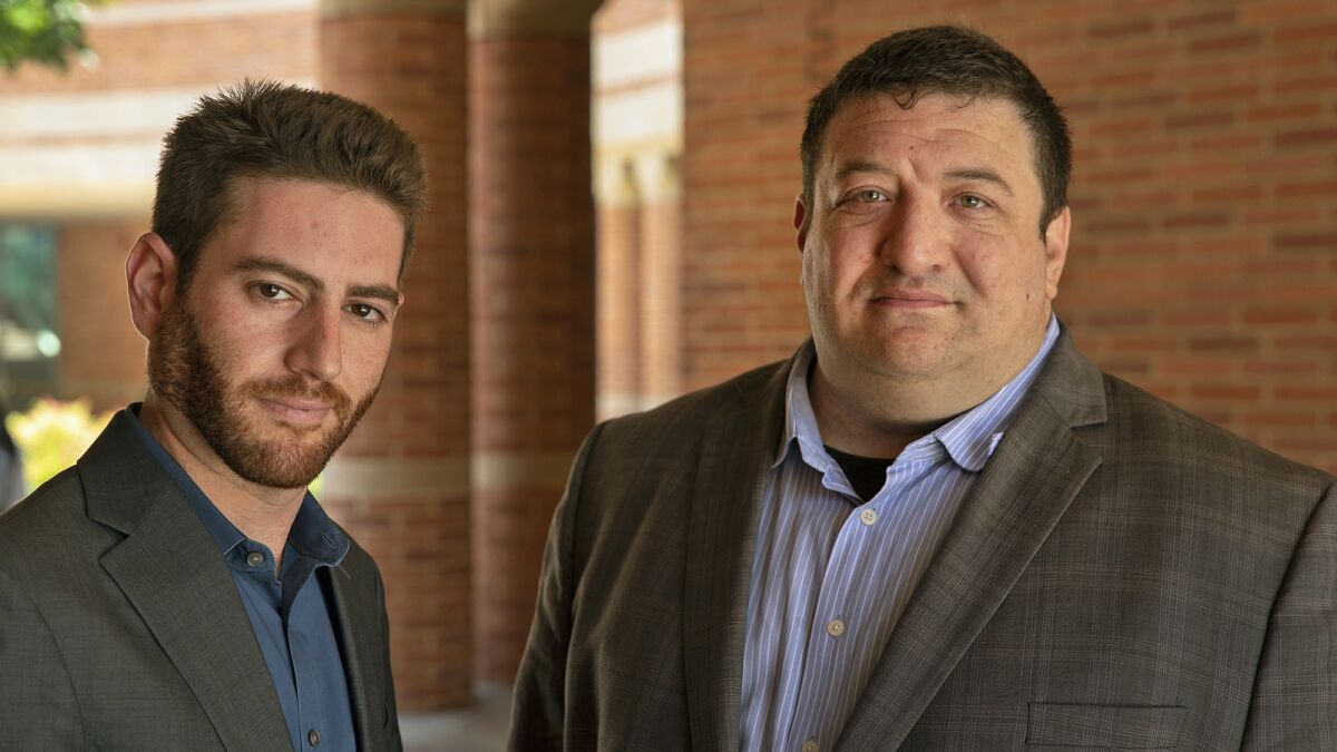 Ken Borkan, left, and Brent Gerson, cannabis conference organizers and MBA students at the UCLA School of Management.