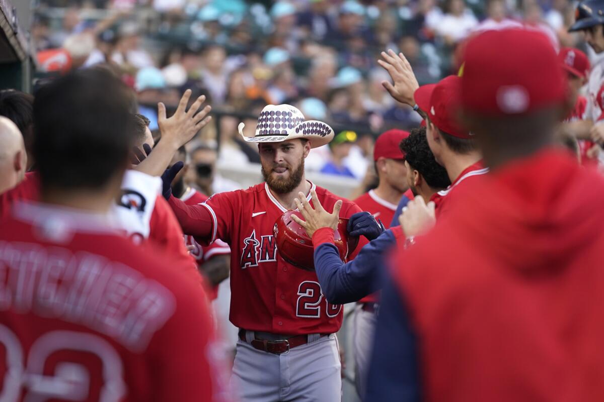 The Angels' Jared Walsh (20) celebrates his home run in the second inning Aug. 19, 2022. 