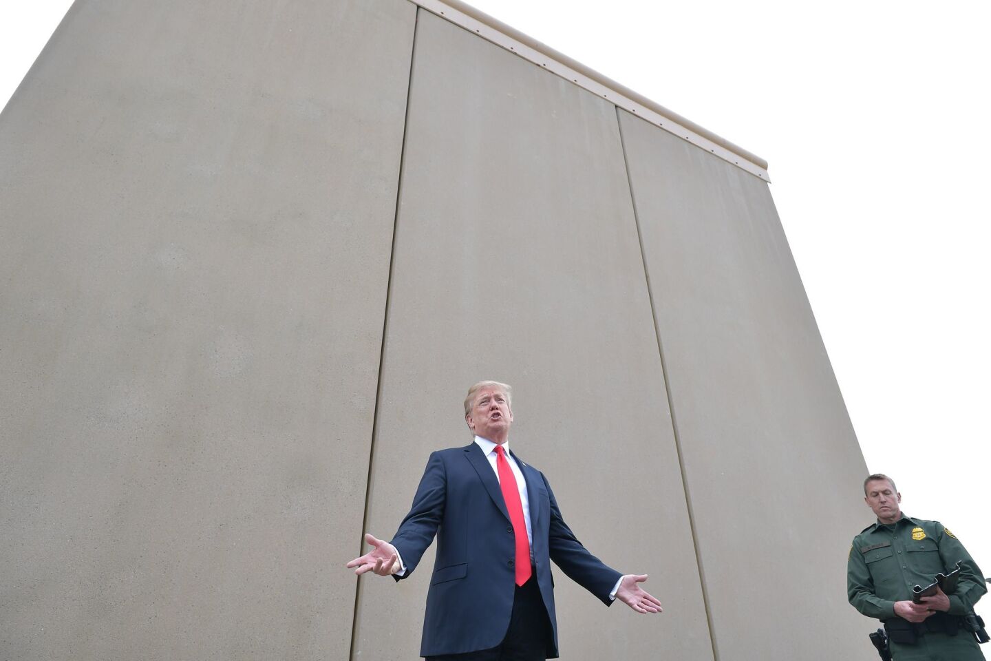 President Trump inspects proposed border wall prototypes near San Diego on March 13.