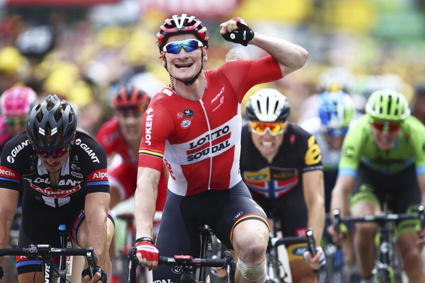 Germany's Andre Greipel celebrates as he crosses the finish line to win the 15th stage of the Tour de France on Sunday.