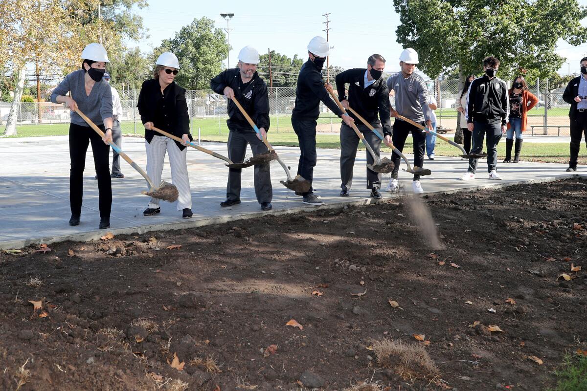 The Orange County Soccer Club breaks ground on a miniature outdoor hard-surface soccer field in Santa Ana.
