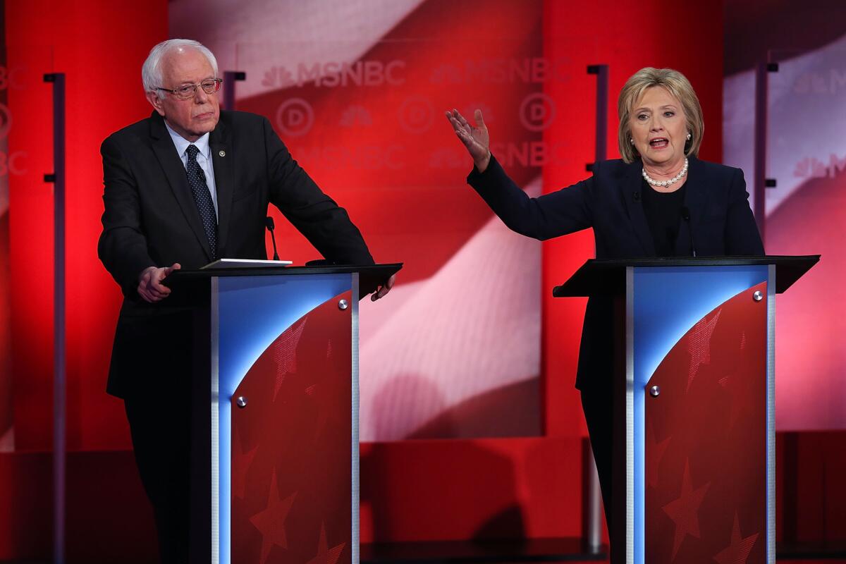 Bernie Sanders and Hillary Clinton in their New Hampshire debate.