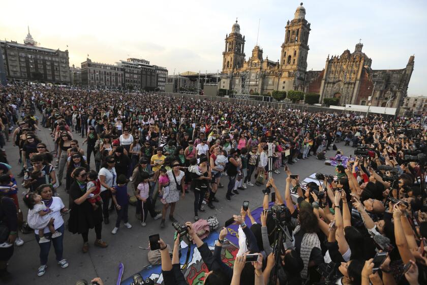 Feminist activists protest at the Zocalo square in Mexico City, Friday, Nov. 29, 2019. According the to the federal government there were 3,662 gender-related killings of women in Mexico in 2018. (AP Photo / Marco Ugarte)