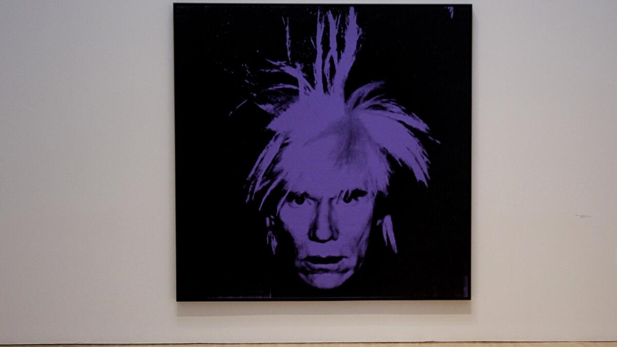 A self-portrait by Andy Warhol at MOCA. Warhol's diaries have been reissued in a 25th anniversary edition.