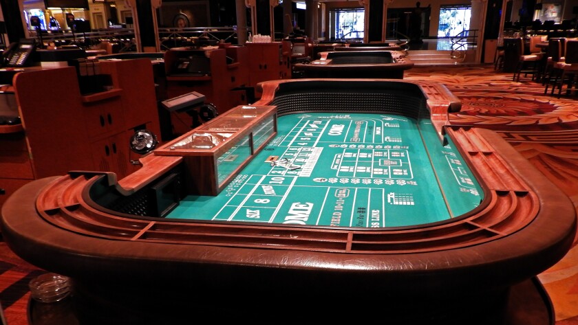 The conviviality and excitement of a crowd craps table will be subdued when Caesars Palace Las Vegas reopens. State regulators will limit craps games to six players at each table.