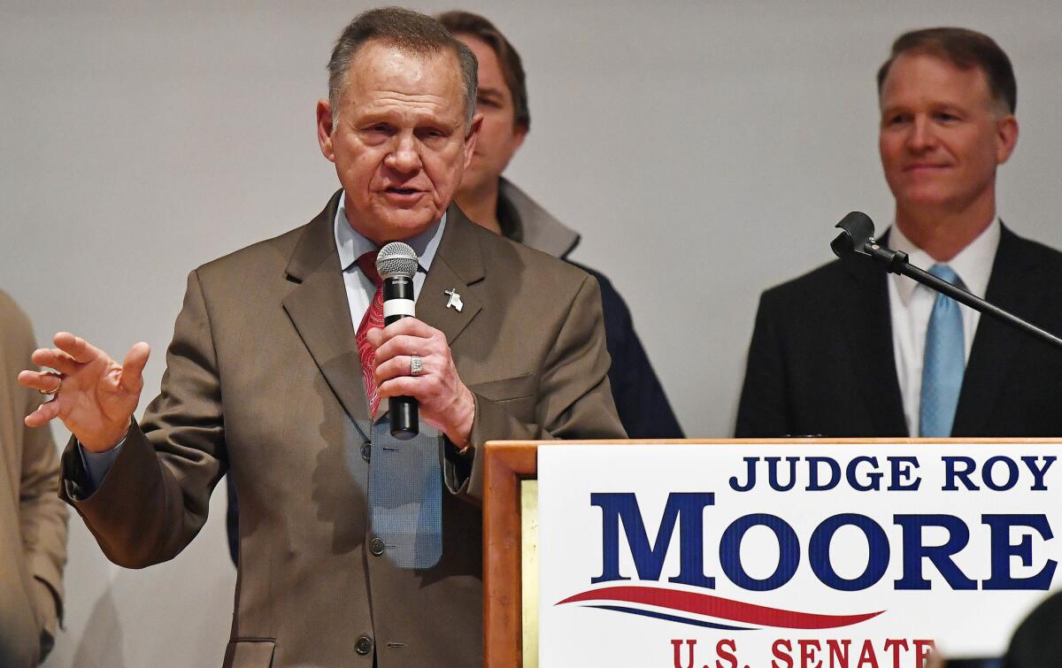 Roy Moore addresses supporters Tuesday night in Montgomery, Ala.
