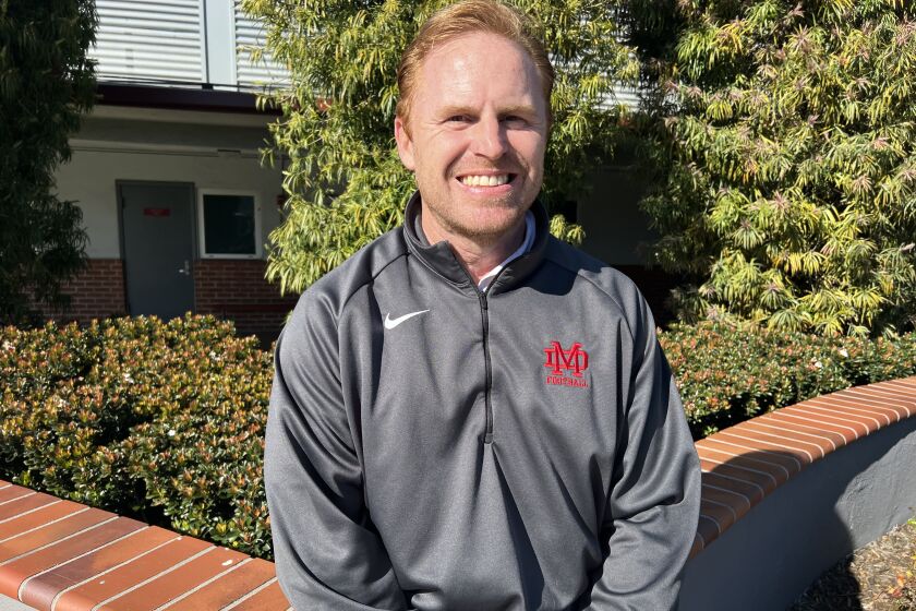 Frank McManus has been hired as the successor to Bruce Rollinson as football coach at Santa Ana Mater Dei.