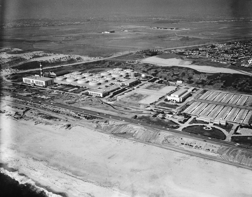 An aerial view of a water treatment plant along the beach 