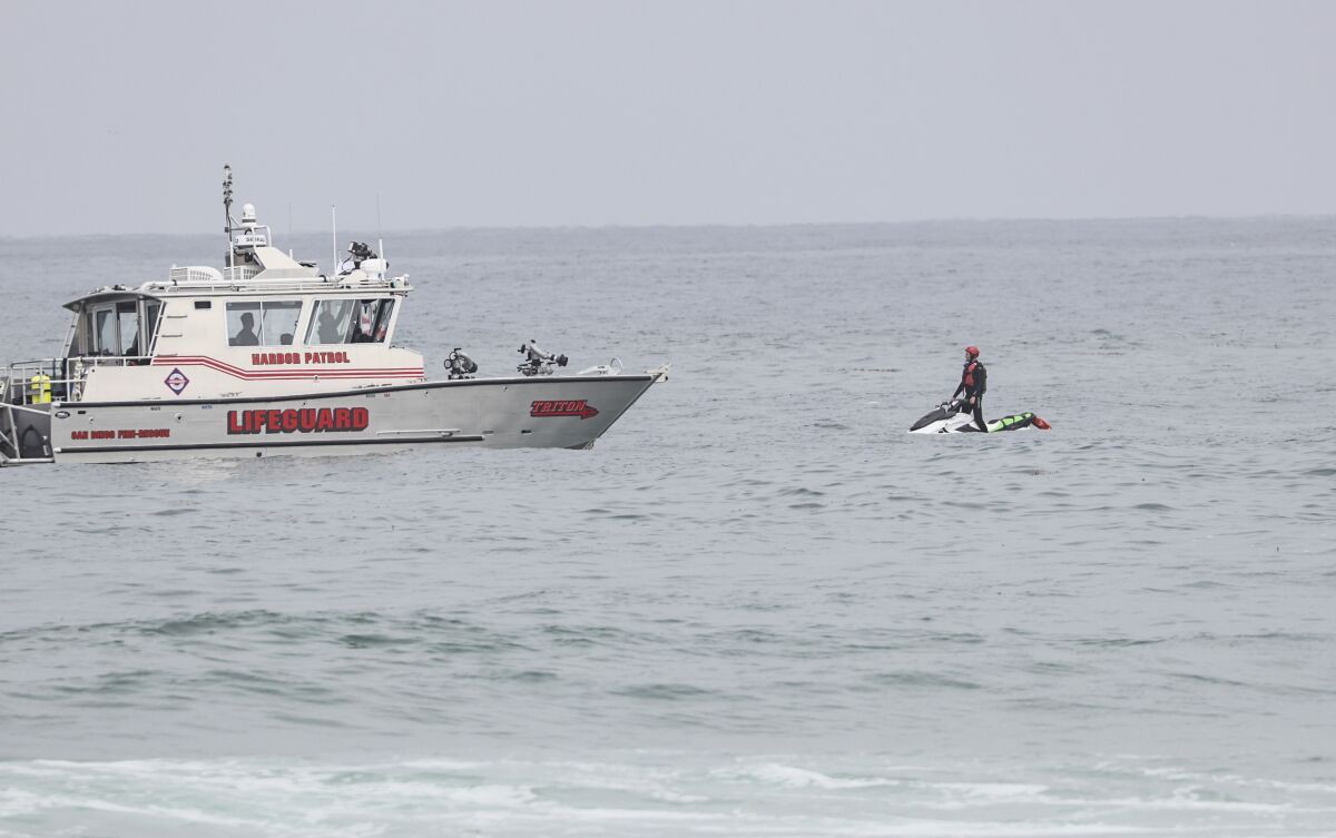 Crews search off Mission Beach for missing swimmer Woodlain Zachee