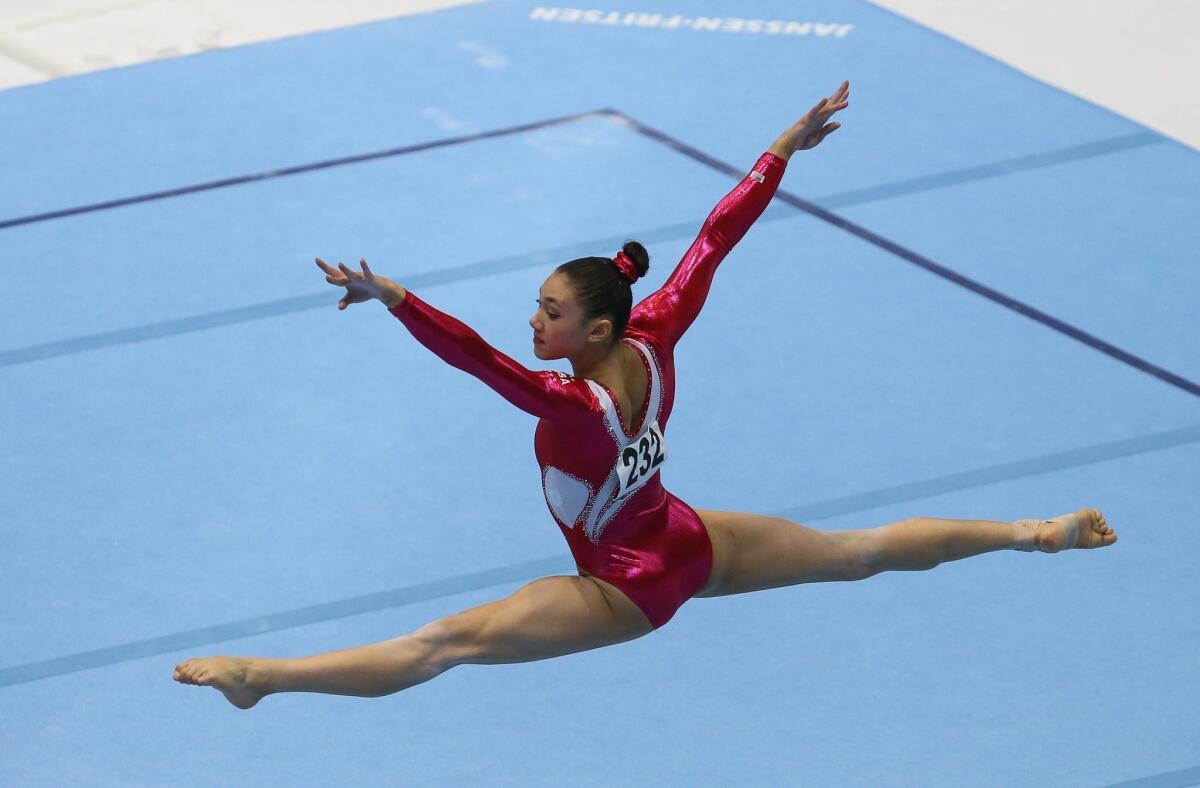 Kyla Ross performs her floor exercise routine at the gymnastics world championships in Belgium on Sunday.
