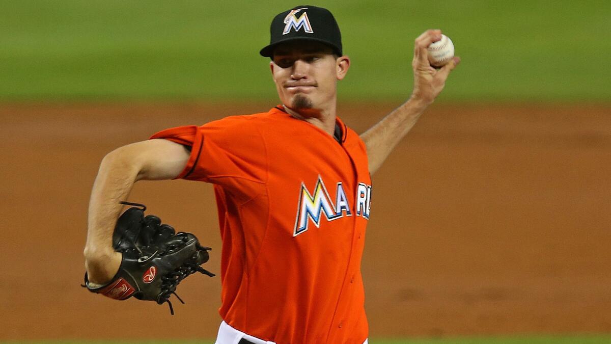 Miami Marlins starter Andrew Heaney delivers a pitch during a game against the Oakland Athletics in June. Heaney, acquired by the Angels in a trade with the Dodgers, is one of the Angels' top prospects.