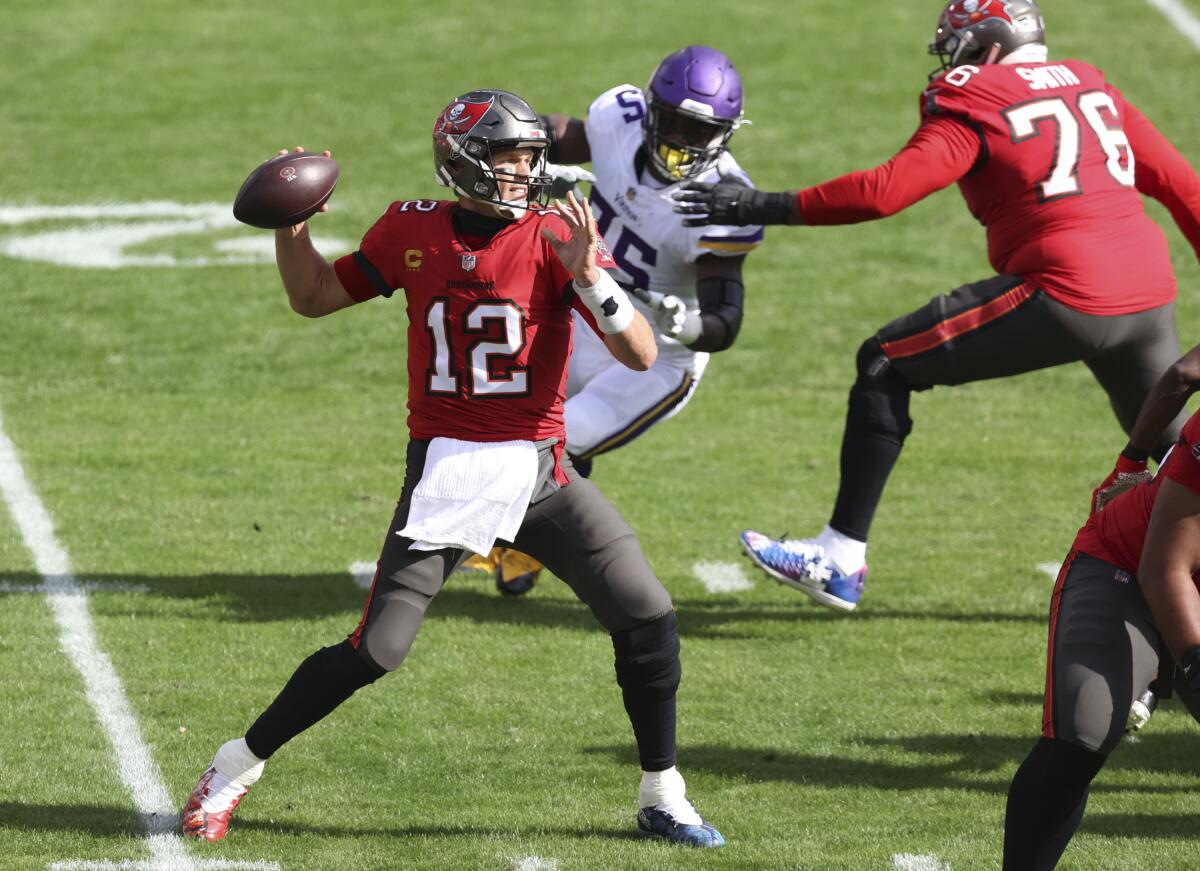 Tampa Bay Buccaneers quarterback Tom Brady throws a pass against the Minnesota Vikings on Sunday.
