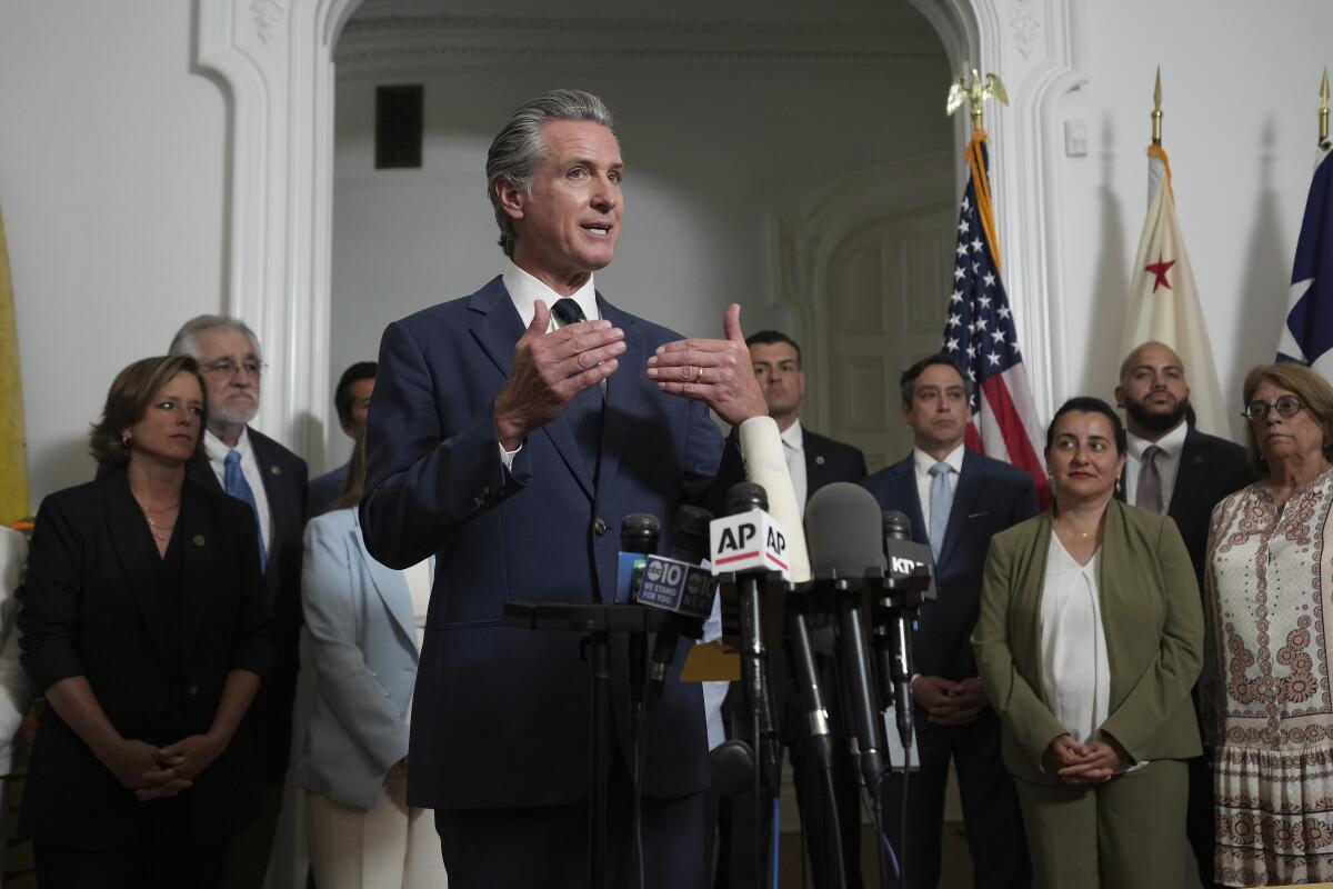 Newsom warns Trump on red-state redistricting: 'Playing with fire' - Los Angeles Times