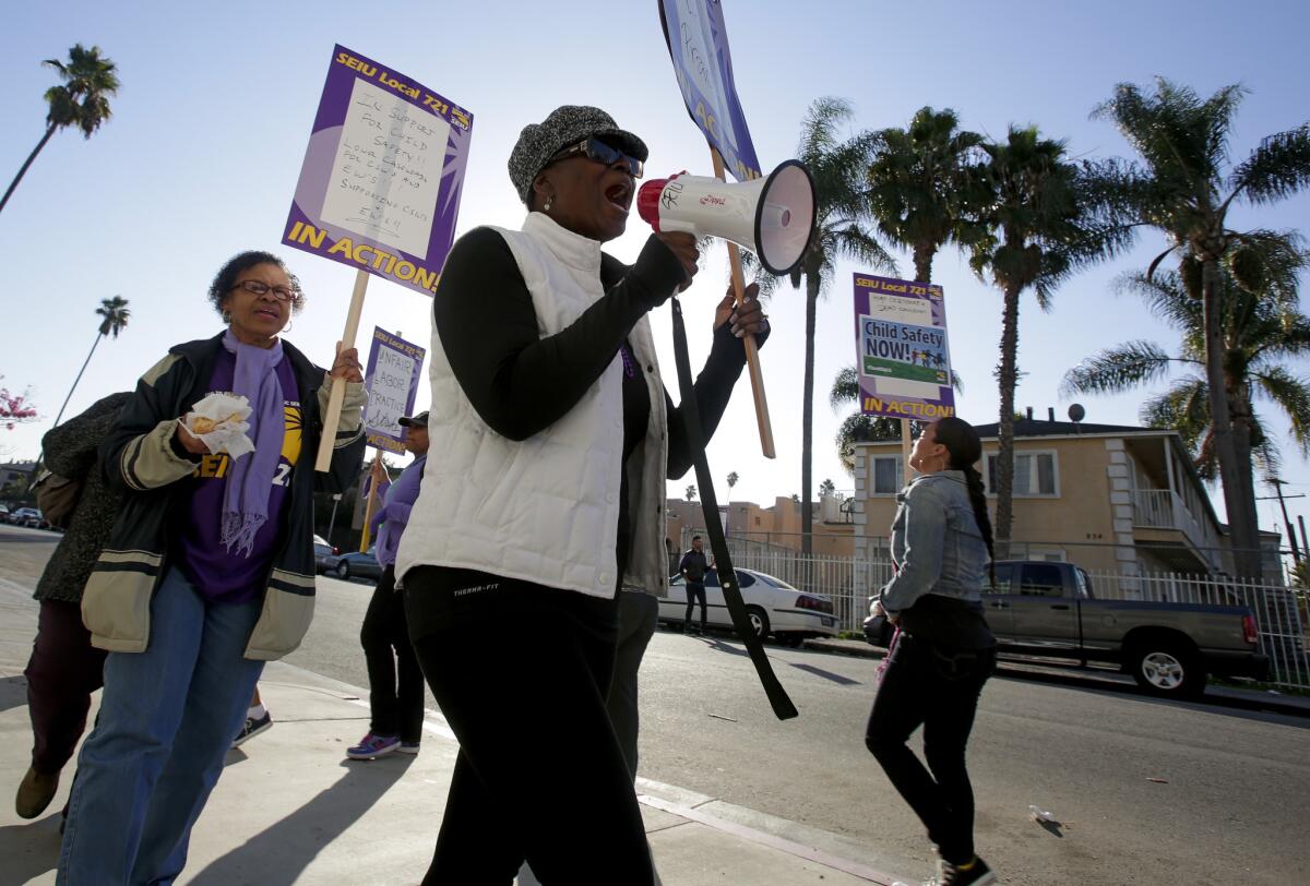 L.A. County's children's social workers, represented by Local 721 of the Service Employees International Union, strike Dec. 5 amid contentious labor talks.