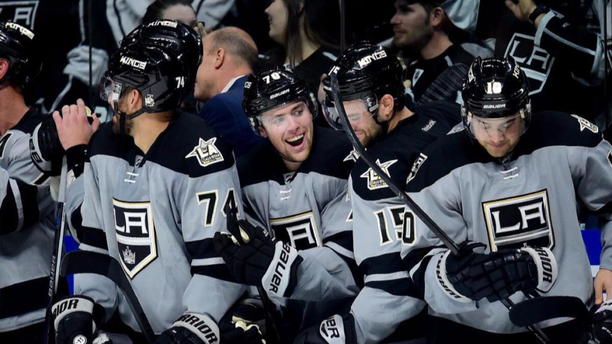 Kings players celebrate after Tanner Pearson's shootout goal against the Canucks on Oct. 22.