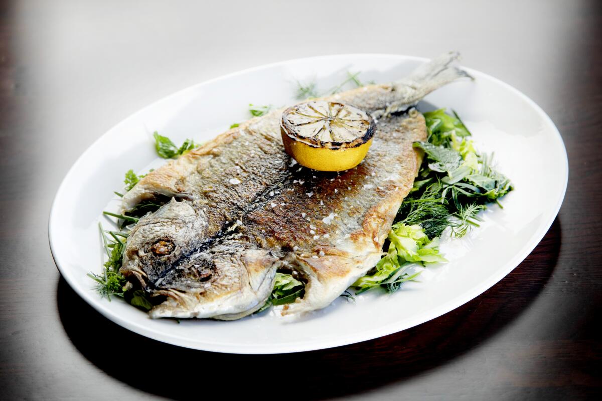 The whole branzino alla piastra at Chi Spacca