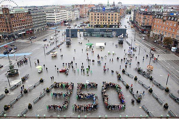 About 300 people gathered in the City Hall Square in Copenhagen to form the logo of the 350 campaign on the International Day of Climate Action. The campaign is calling for carbon emissions to be cut to 350 parts per million.