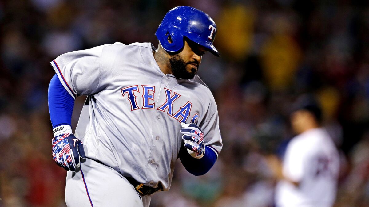 Rangers designated hitter Prince Fielder rounds the bases after hitting a two-run home run off Red Sox starter Steven Wright during a game July 6 in Boston.
