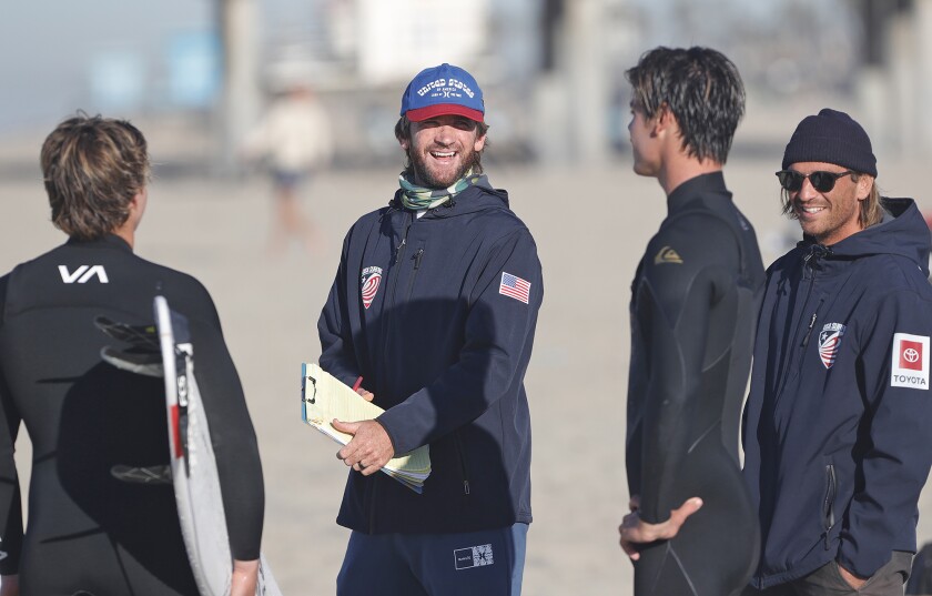 USA Surfing junior team coach Brett Simpson chats with members of the junior team.