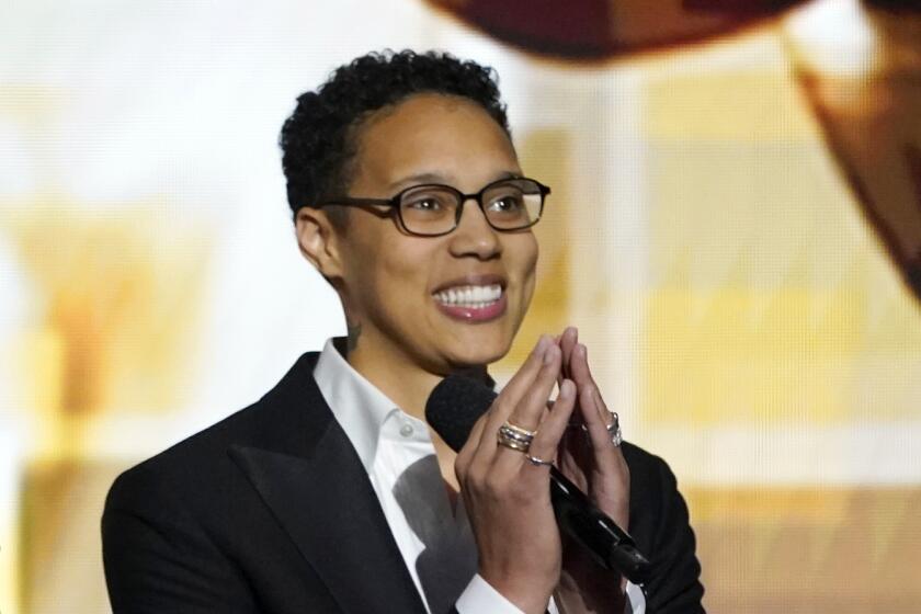 Brittney Griner wearing glasses and a suit at the NAACP Image Awards