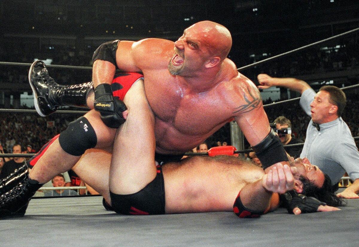Professional wrestler Bill Goldberg, shown dominating Scott Hall in a WCW match in 1998, is asking $3.2 million for his Bonsall estate, which sits on 28 acres with a car museum, a sports court, equestrian facilities and 15 miles of riding trails.