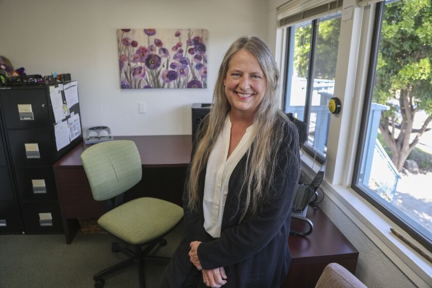 CARLSBAD, CA - OCTOBER 14: Executive director Kimberly Larsen, poses for photos in her office at Community Interface Services on Thursday, Oct. 14, 2021 in Carlsbad, CA. (Eduardo Contreras / The San Diego Union-Tribune)