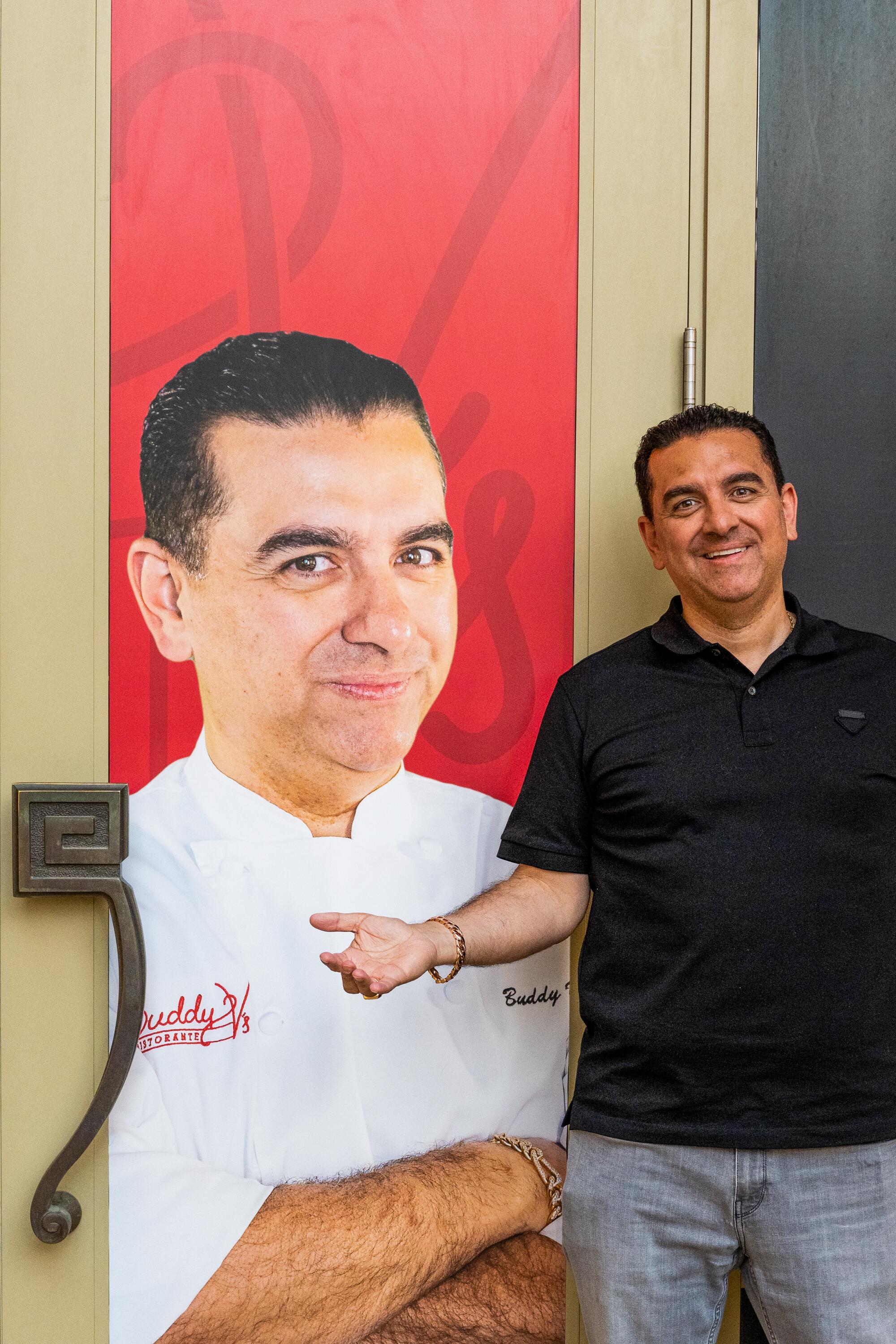 Buddy Valastro poses with a photo of himself outside the Venetian.