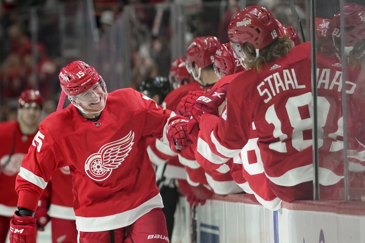 Detroit Red Wings left wing Jakub Vrana (15) celebrates his goal against the Columbus Blue Jackets in the third period of an NHL hockey game Saturday, April 9, 2022, in Detroit. (AP Photo/Paul Sancya)