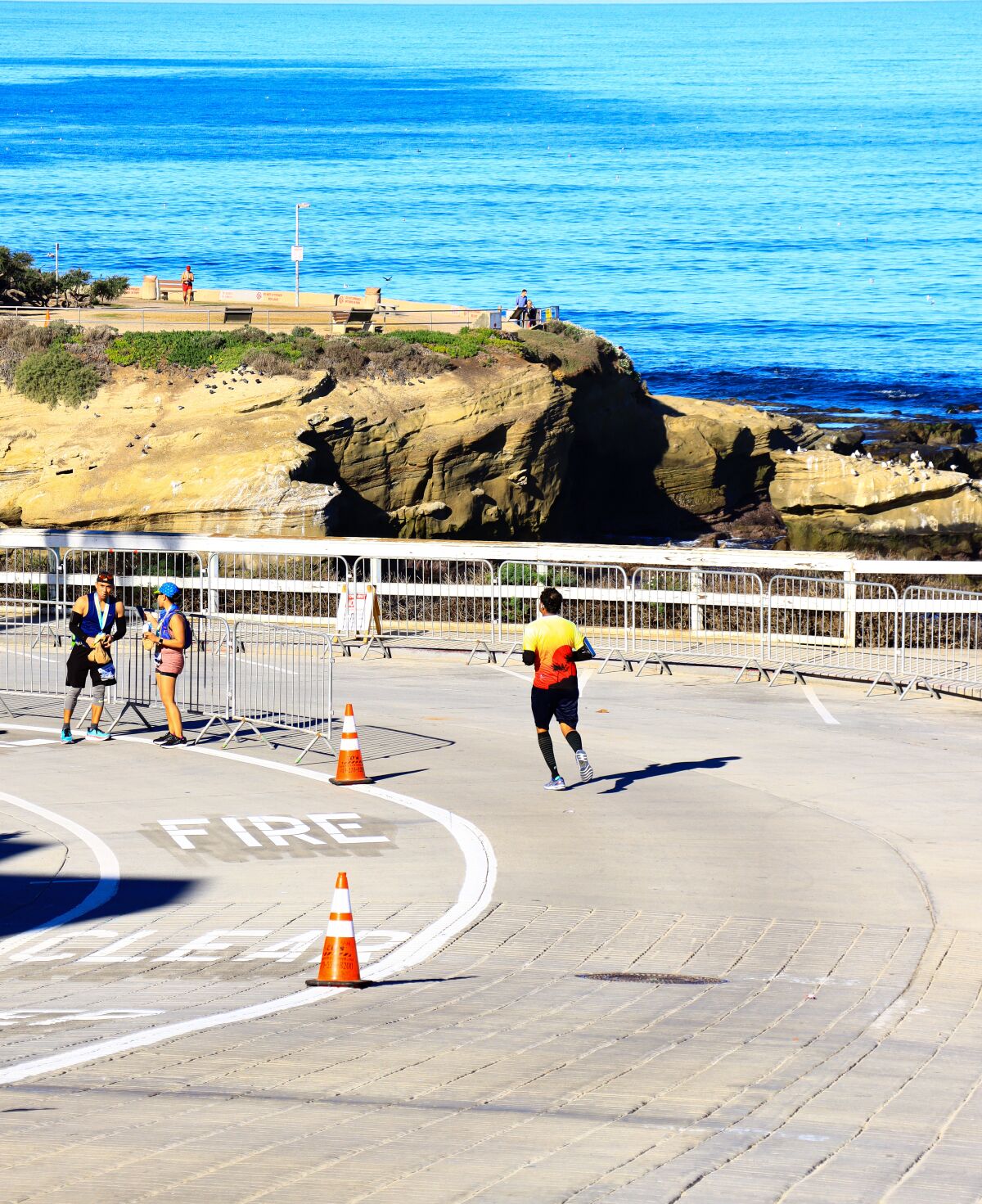 A runner makes his way toward the finish of the La Jolla Half Marathon.